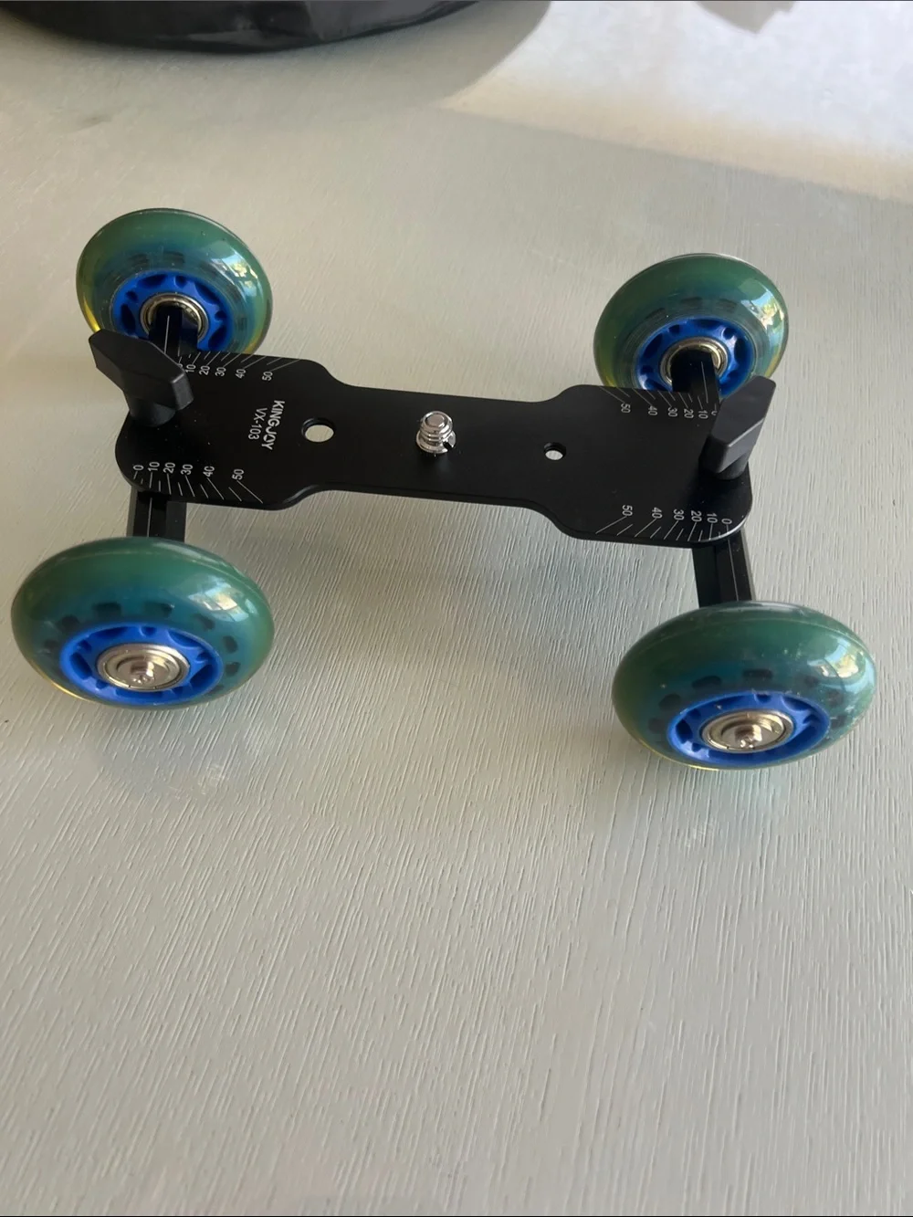 Compact Camera Dolly with Green and Blue Wheels - Black Frame